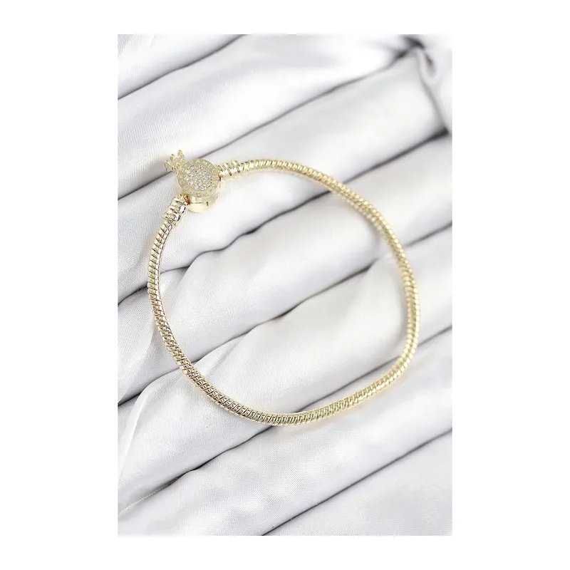 Pirinç Charm Zirkon Taşlı Taç Model Gold Renk Kadın Bileklik