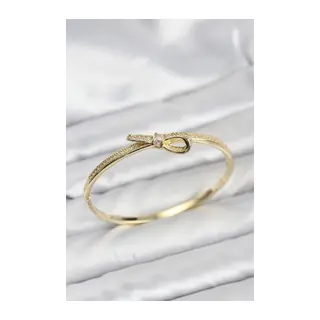 Pirinç Gold Renk Zirkon Taşlı Fiyonk Model Kadın Kelepçe Bileklik