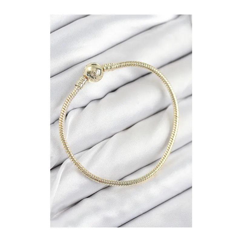 Pirinç Charm Topcuk Model Gold Renk Kadın Bileklik