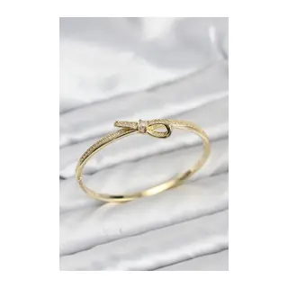 Pirinç Gold Renk Zirkon Taşlı Fiyonk Model Kadın Kelepçe Bileklik